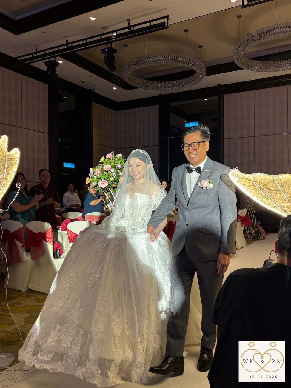 Bride and groom making their grand entrance down the hall